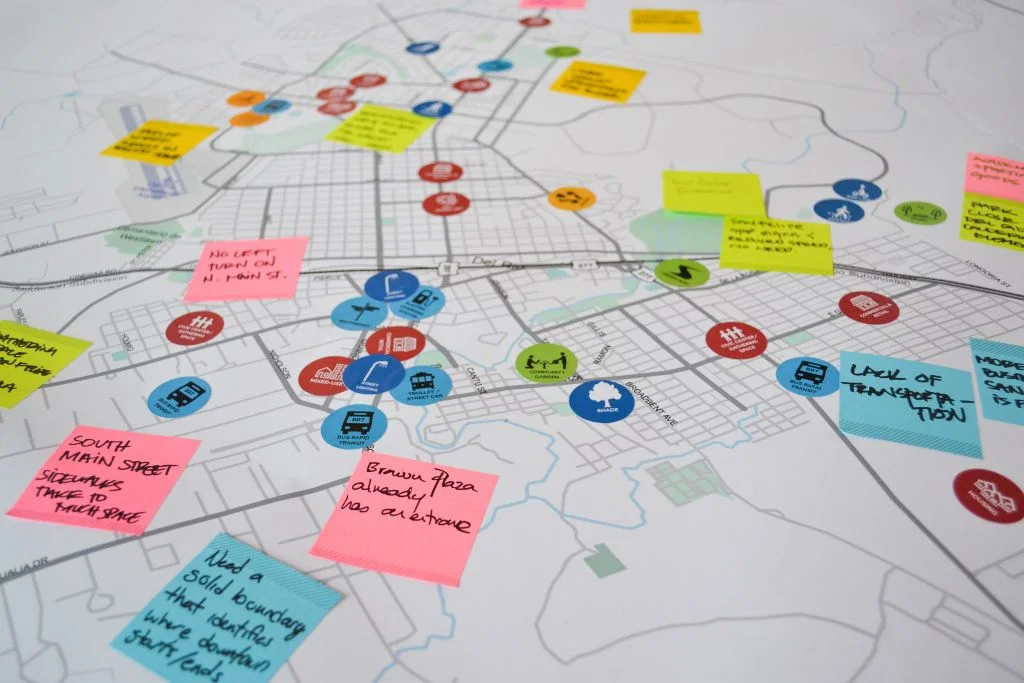 Interactive planning map with colorful sticky notes and markers, highlighting community feedback and strategic points in the Del Rio Comprehensive Plan by Able City.